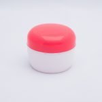 Pote HDPE color blanco con orla tapa salmón 50 gr