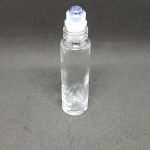 Frasco de vidrio transparente roll on piedras naturales