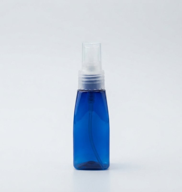 triangualr40cc Frasco PET triangular azul 20/410 con atomizador blanco 40 cc - Imagen 1
