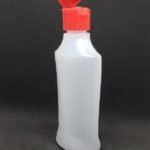 Frasco LDPE color natural acinturado base ovalado tapa flip top roja 100 ml