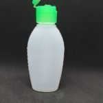 Frasco LDPE color natural base ovalada tapa verde 50 cc
