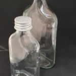 Frasco de vidrio transparente petaca con tapa o bomba