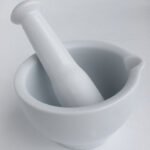 Mortero de porcelana cóncavo con pistilo