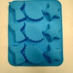 Molde de silicona color azul con diseño de estrella de mar