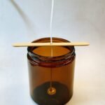 Palito de madera perforado para vela