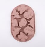Molde de silicona color rosado de mariposas