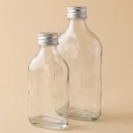 Frasco de vidrio transparente petaca con tapa o bomba