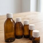 Frasco farmacéutico de vidrio ámbar 28/410 con tapa y tapón integrado