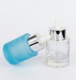 Frasco de vidrio gotario ancho con pipeta aluminio celeste y transparente