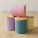 Pote de vidrio pintado diferentes colores con tapa de bamboo y sello para vela